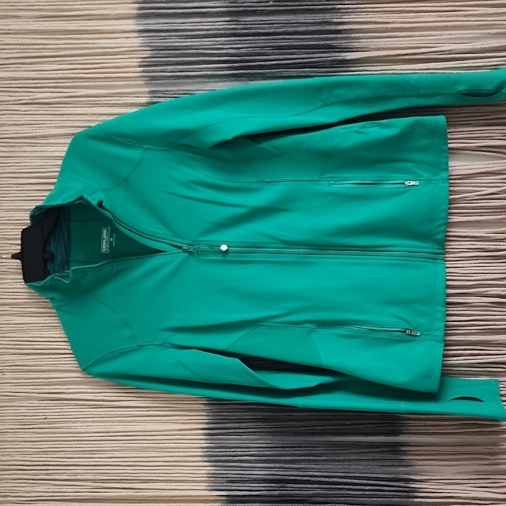 Activewear. Turquoise zip up jacket (M).